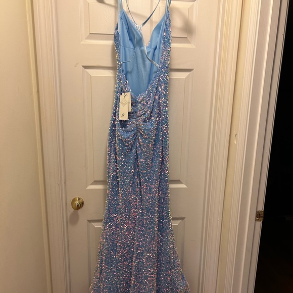 Beautiful brand new prom dress size 4 no alterations. Never worn, only tried on. - Picture 6 of 6